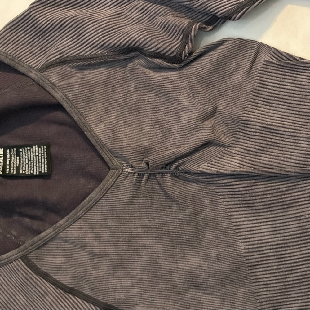 Gray v neck stretchy athletic long sleeve.